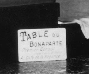 Archival photograph of a handwritten table label mentioning Bonaparte.