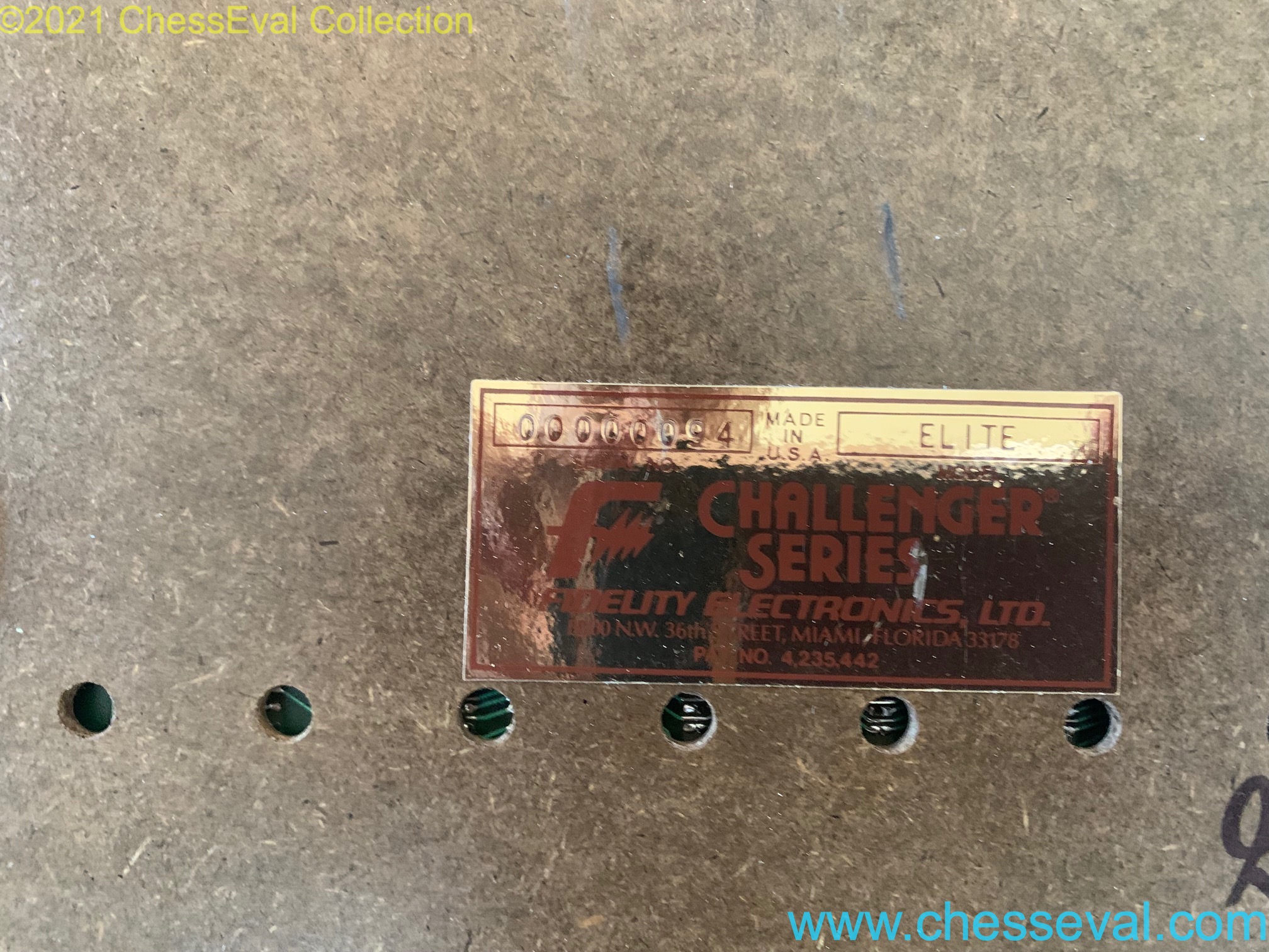 Close view of the manufacturer’s identification plate on the underside.