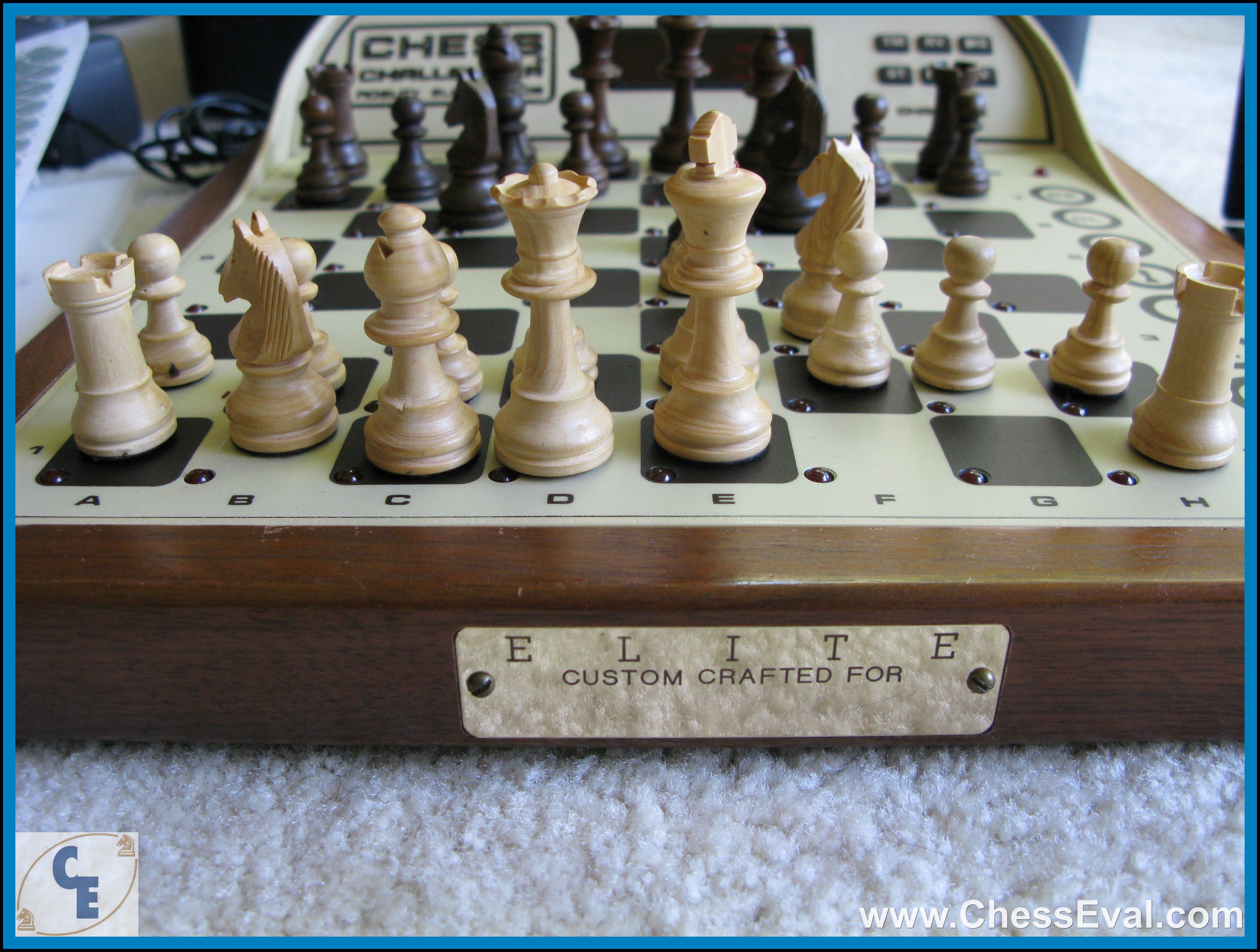 Board, chess pieces and engraved Elite Champion front plaque.