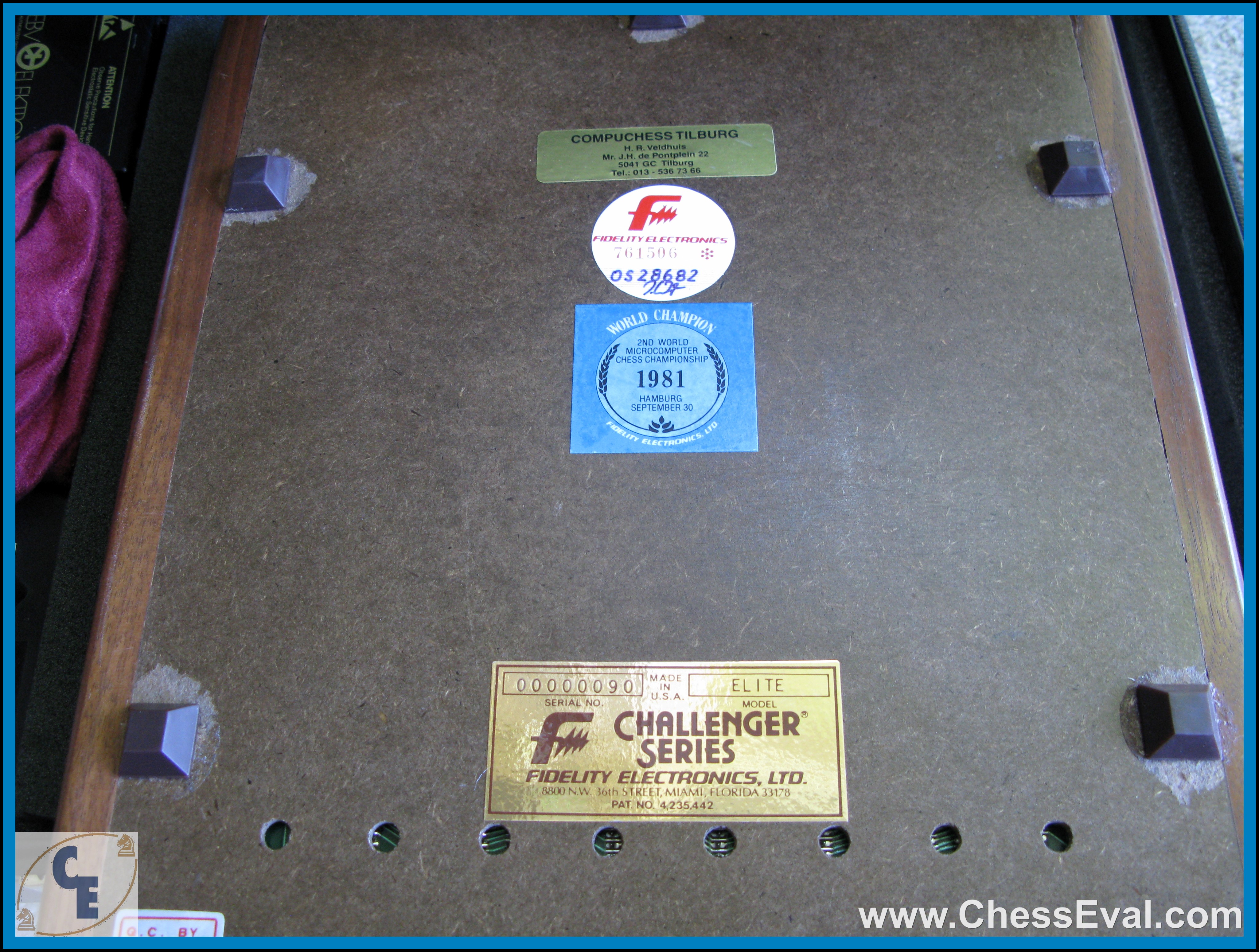 Underside of Elite Champion serial 090 with its identification and championship labels.